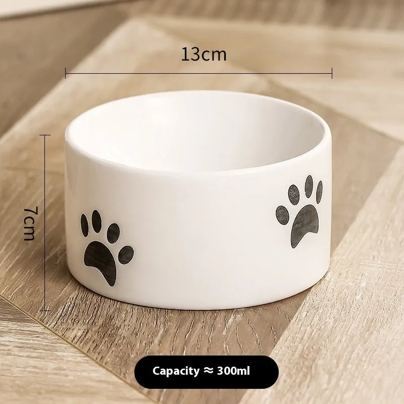 Ceramic cat bowl with neck protection design and cat's paw pattern in selected colour