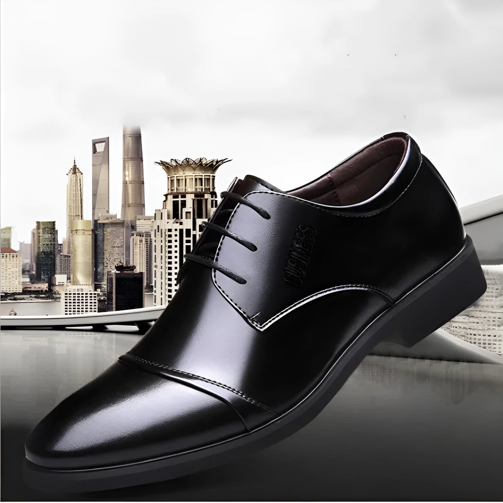 Men's black formal lace-up shoes with stitching details on PU leather upper