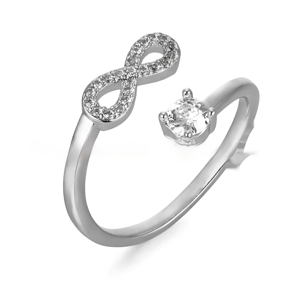 Personalised geometric open ring with inlaid zircon stones, shown on a finger, available in gold, rose gold, and silver.