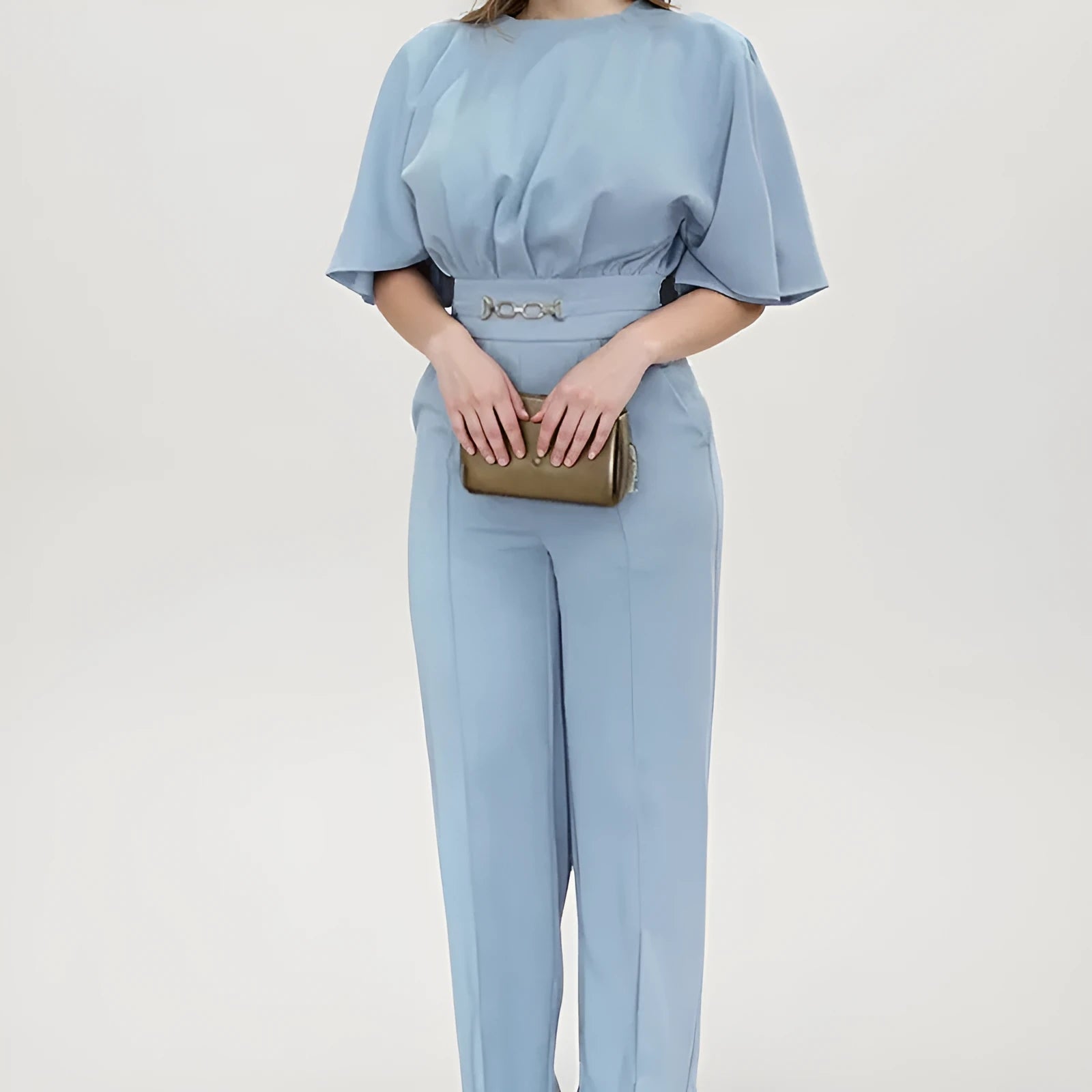 Blue polyester men's two-piece suit with trousers and long-sleeve jacket on hanger