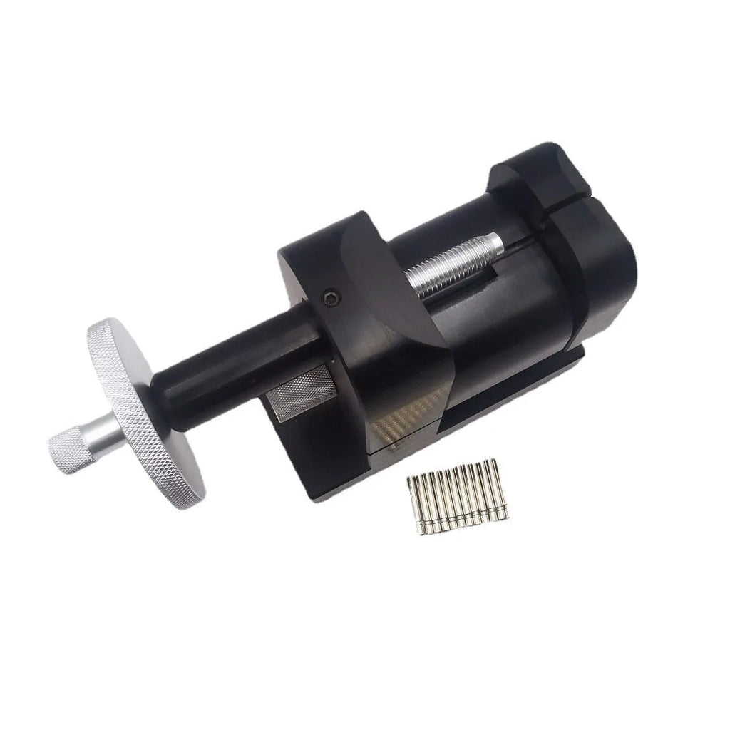 Alloy steel watch strap removal machine and tool set for professional watch repair.