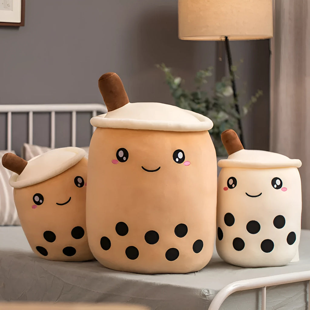 Brown and pink boba milk tea plush stuffed toy shaped like a fruit and drink cup.