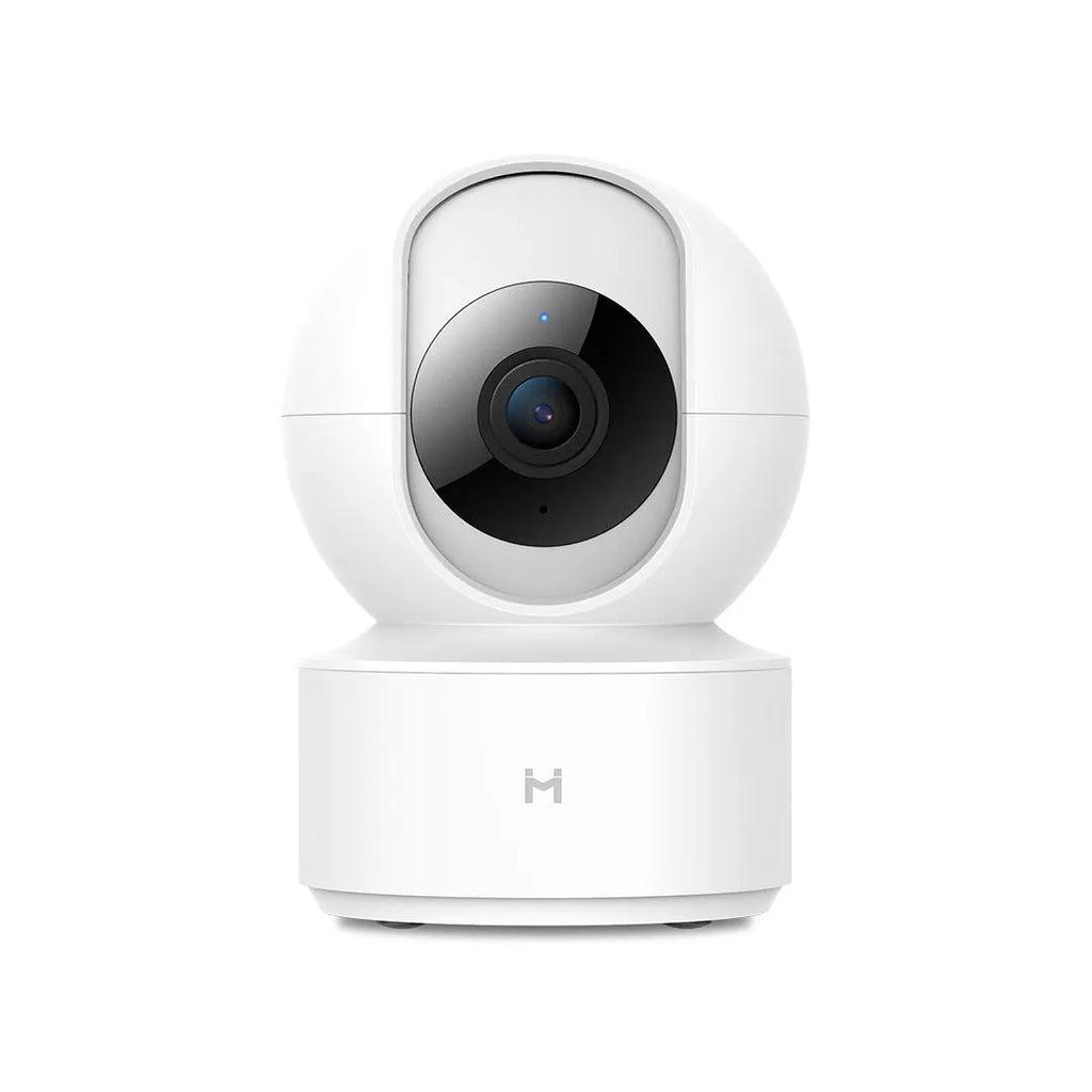 White Xiaobai smart security camera on a surface showing its compact design.