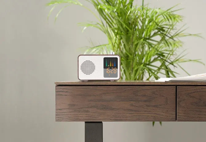 Brown wood grain retro Bluetooth speaker radio with AM/FM reception and portable design