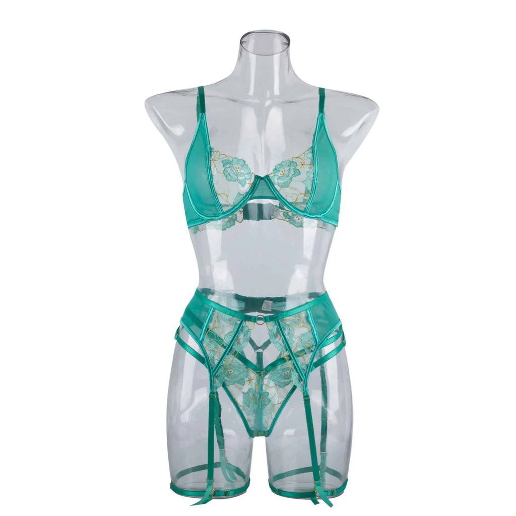 Light green women's embroidered bra and matching briefs set on a white background.