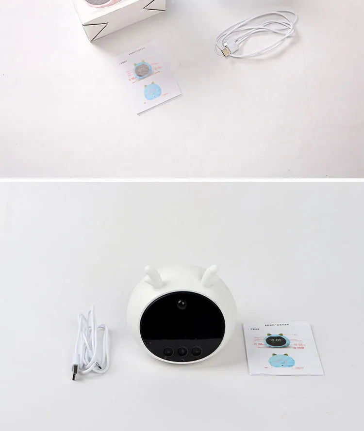 Smart alarm clock with voice dialogue and motion sensor in animal design with luminous display