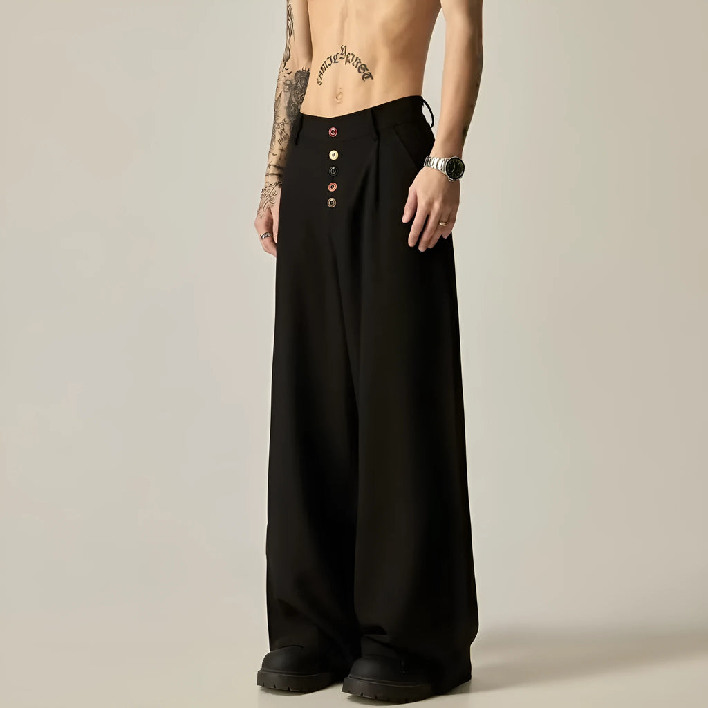 Men's solid colour wide-leg casual trousers in black, showing elastic waist and straight leg cut.