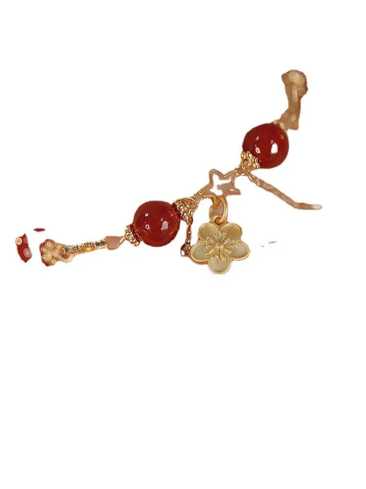 Women's red agate bracelet with double layer design and peach blossom floral elements