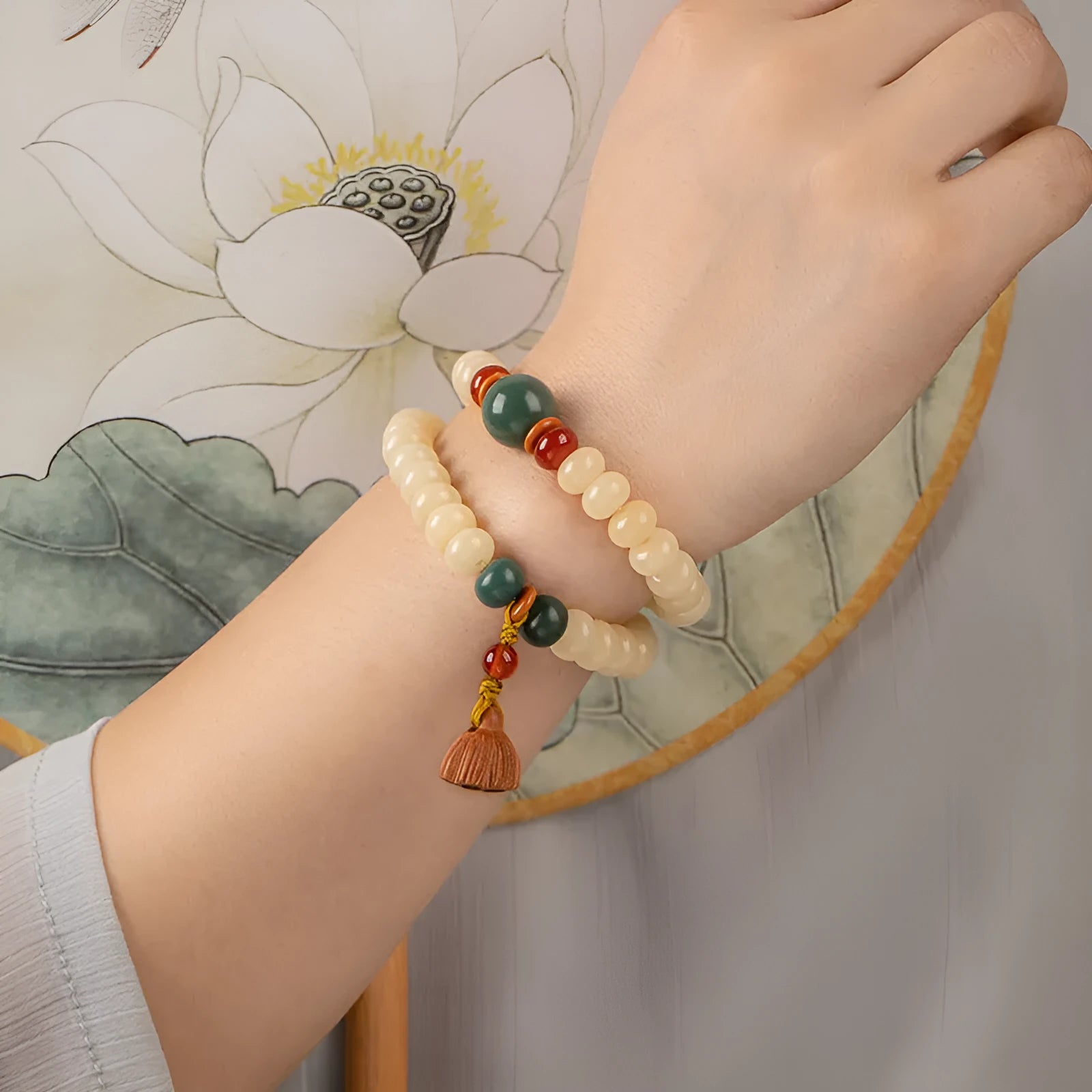 Milk butter coloured Bodhi root wooden bracelet with 6x9mm flat round beads and double ring design