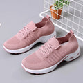 Women's black mesh lace-up sneakers with a round toe and non-slip sole on a white background.
