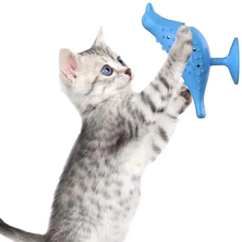 Blue bird shape interactive cat toy with suction cup base on a floor
