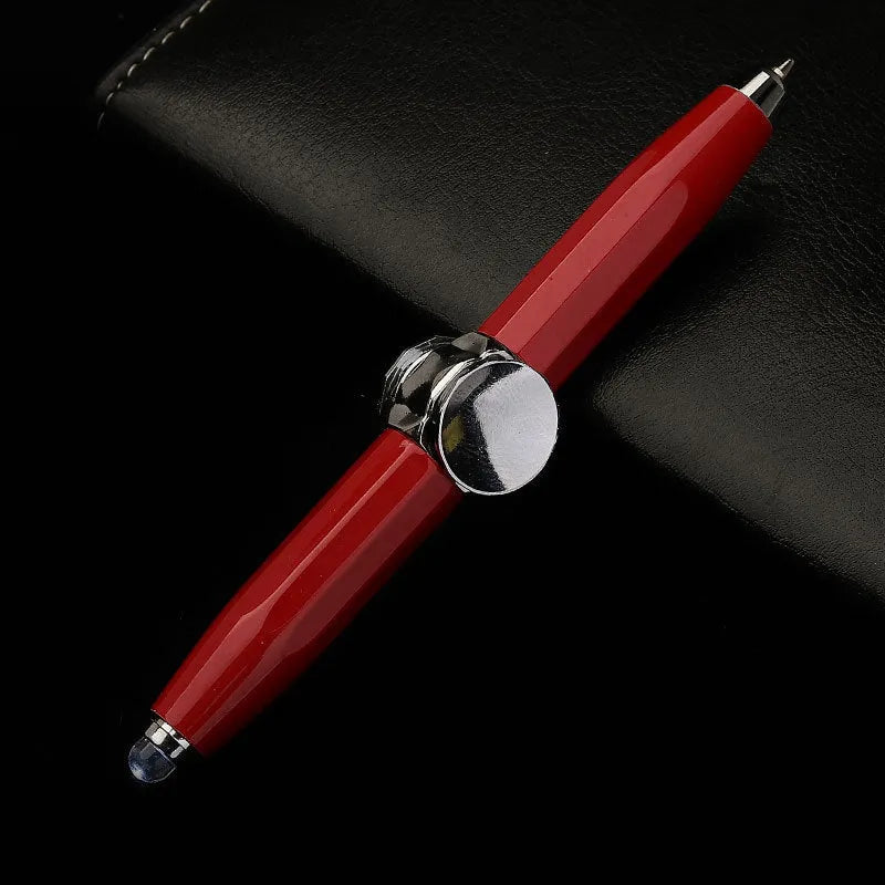 Silver metal LED pen with a spinning gyro top and ballpoint tip, shown with multiple coloured ink refills.