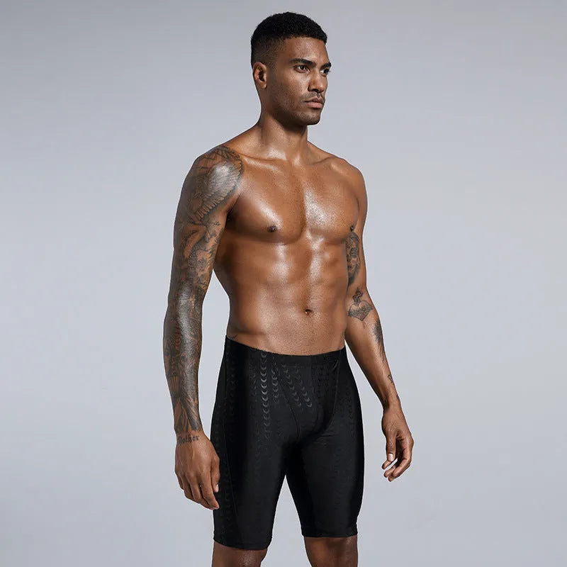 Men's solid colour polyester swimming trunks for beach surfing and swimming, shown in larger sizes.