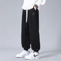 Men's workwear casual sports trousers in dark gray with letter print, polyester fibre, side view