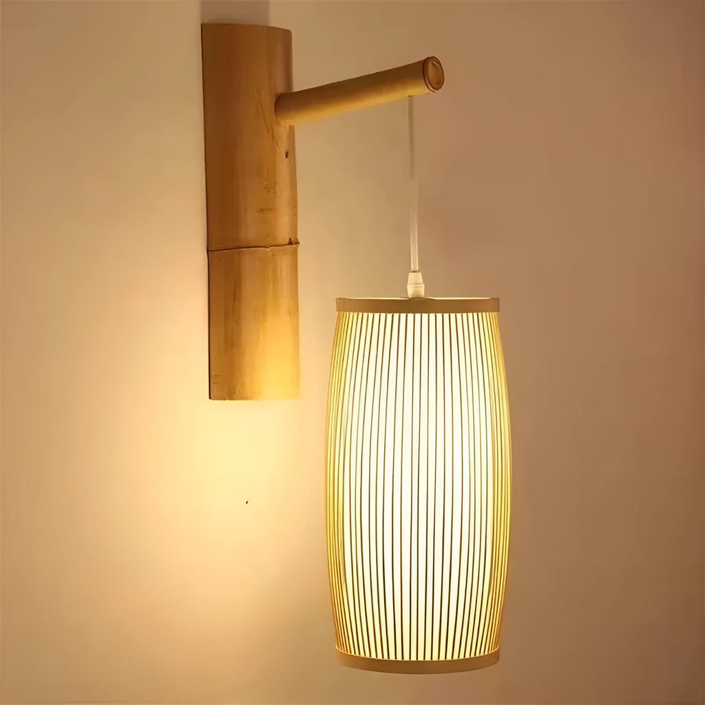 Natural bamboo wall light fixture with a woven shade, measuring 15cm wide and 35cm tall.
