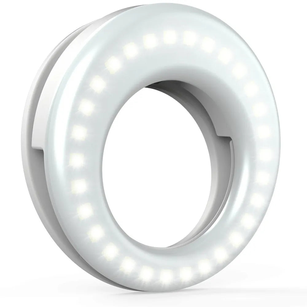 Compact black ring light for smartphone photography with USB charging cable.