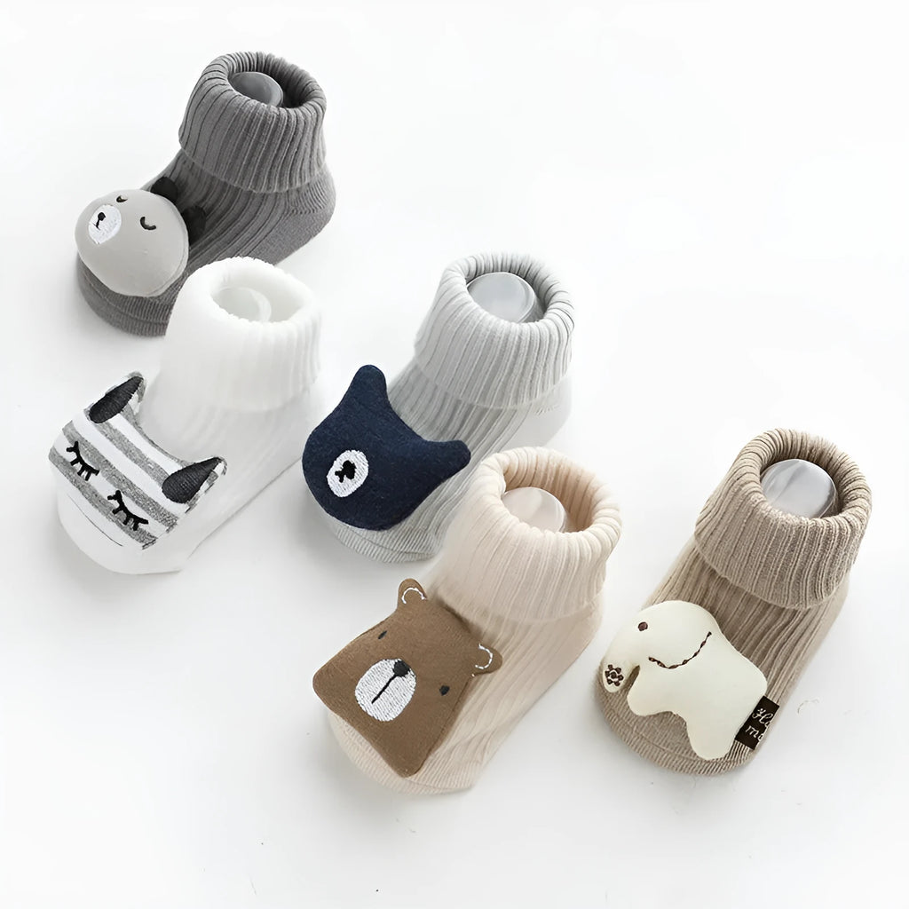 Children's combed cotton non-slip socks in multiple colours for sizes XS, S, and M.
