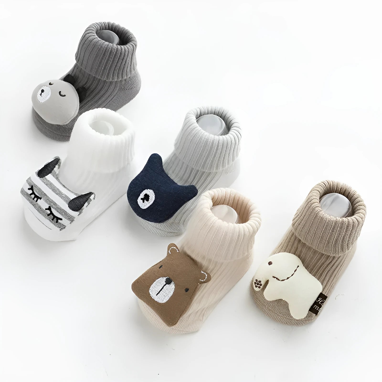 Children's combed cotton non-slip socks in multiple colours for sizes XS, S, and M.
