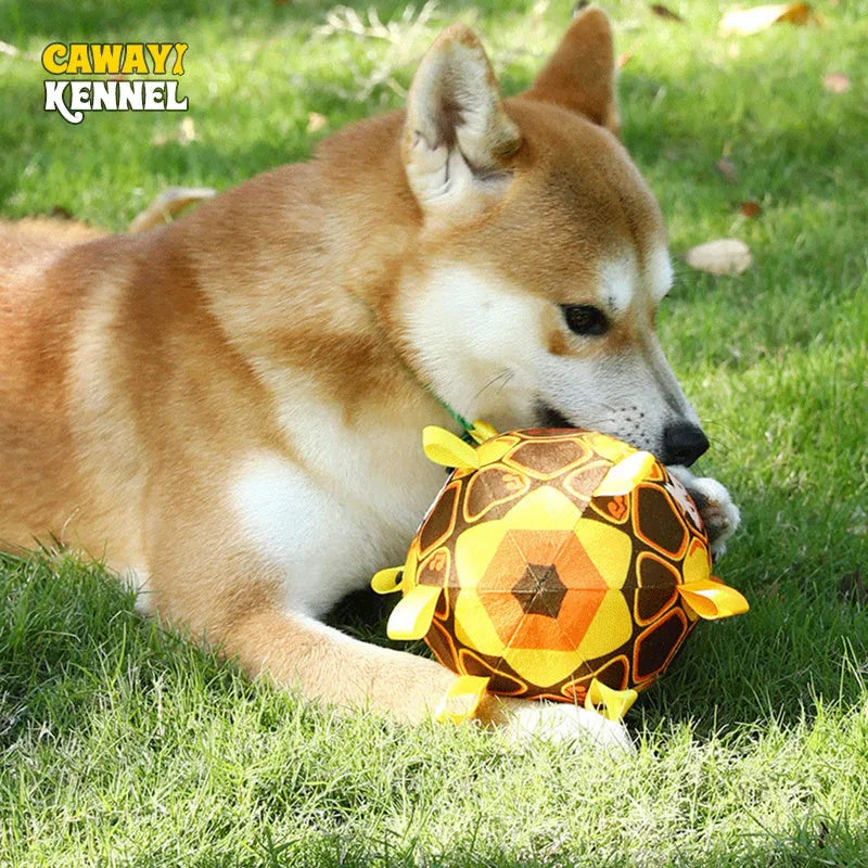 Green interactive ball dog toy with a plush handle for aggressive chewers, measuring 15cm.