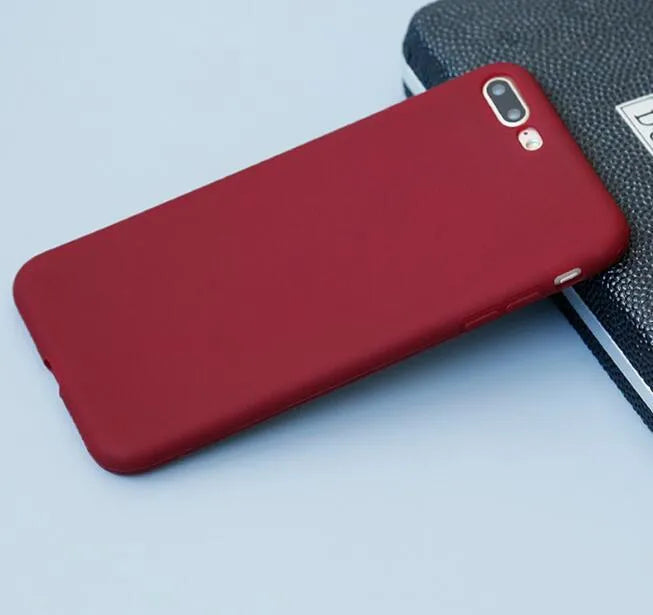 Frosted matte soft shell iPhone case in multiple colours, shown on an iPhone.