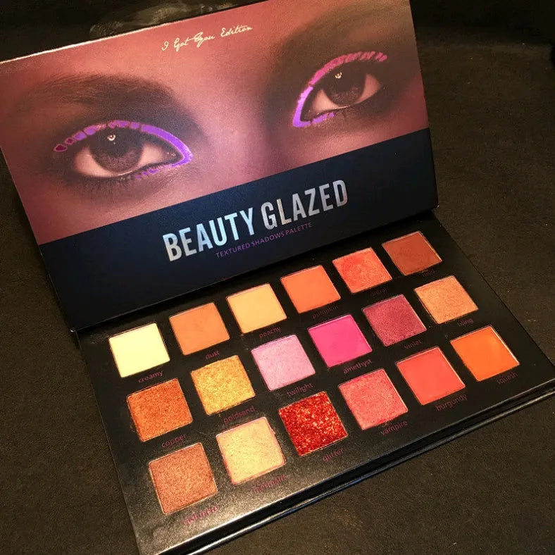 Beauty Glazed 18-colour eyeshadow palette with assorted eyeshadow pans in plastic case