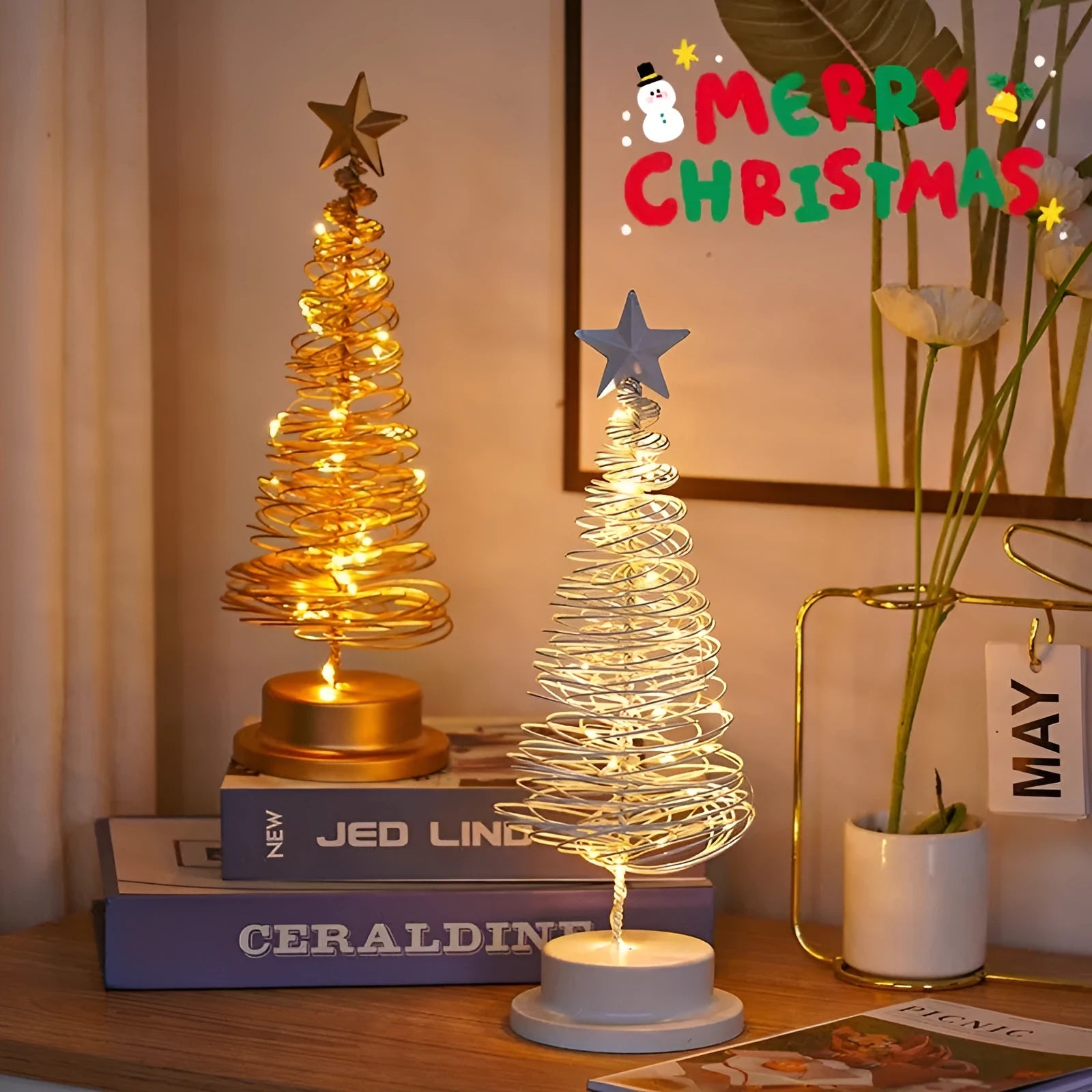 33cm tall metal LED Christmas tree ornament with warm white lights on tabletop