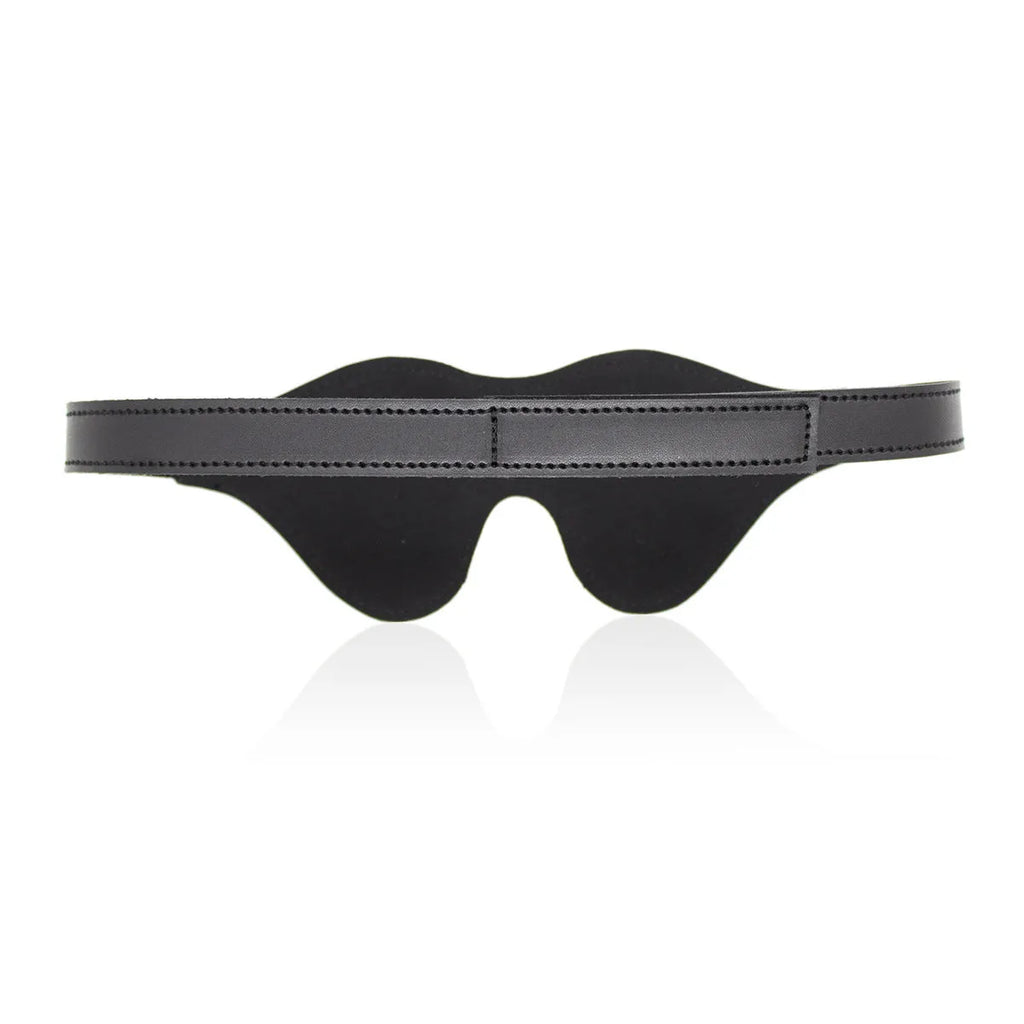 Women's leather eye mask with velcro fastening showing three-dimensional contour design in multiple colour options