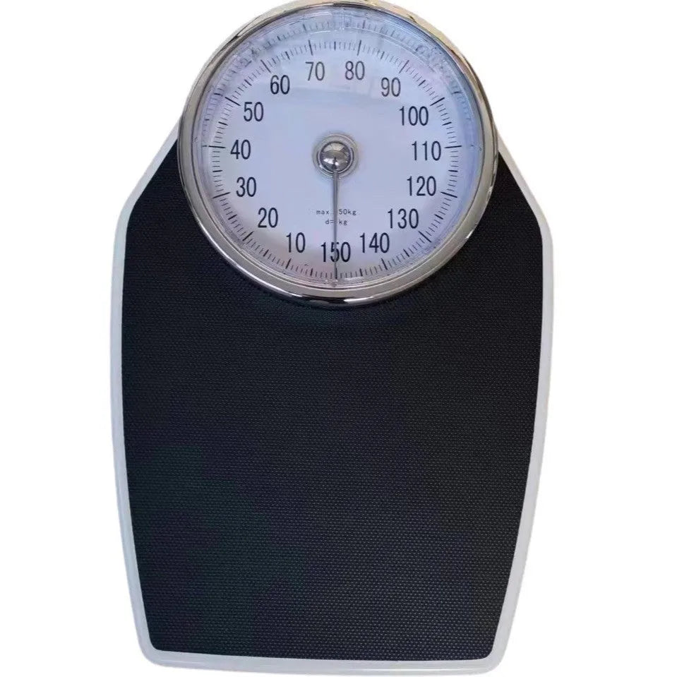 Black mechanical bathroom scale with analogue dial showing weight measurements