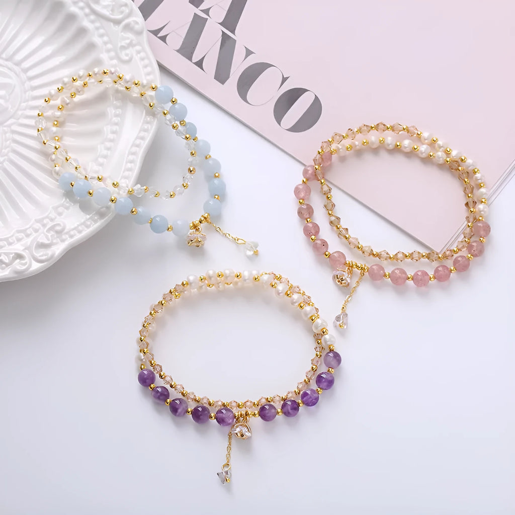 Handcrafted women's double ring crystal bracelet in amethyst, aquamarine, or strawberry quartz colour.