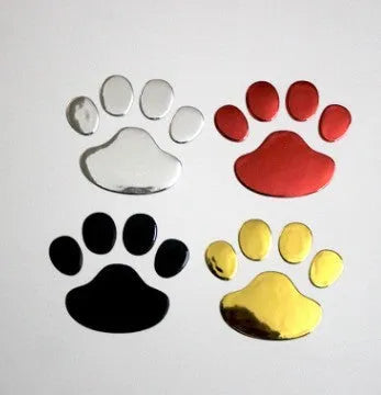 PVC car sticker pair featuring hand-shaped brush dog footprints design in choice of colours