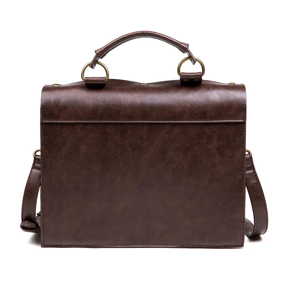 Bronze steampunk style PU leather shoulder bag with metal hardware on a horizontal square pillow bag shape.