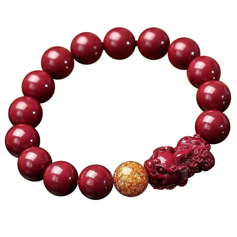 Purple gold sandstone cinnabar bracelet with polished beads and totem design on wrist