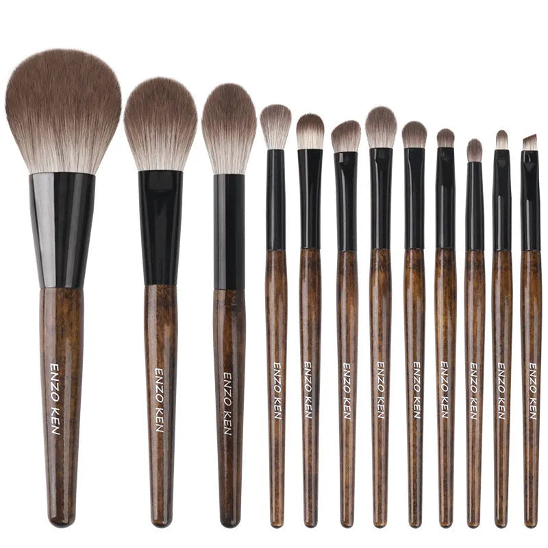 12 piece makeup brush set with artificial fibre brush heads and wooden handles in PU storage bag