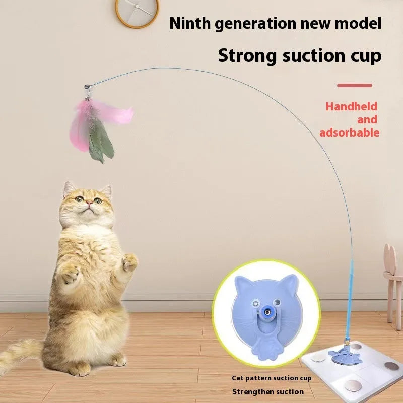 Plastic cat teaser toy with suction cup mount and dangling feather attachment