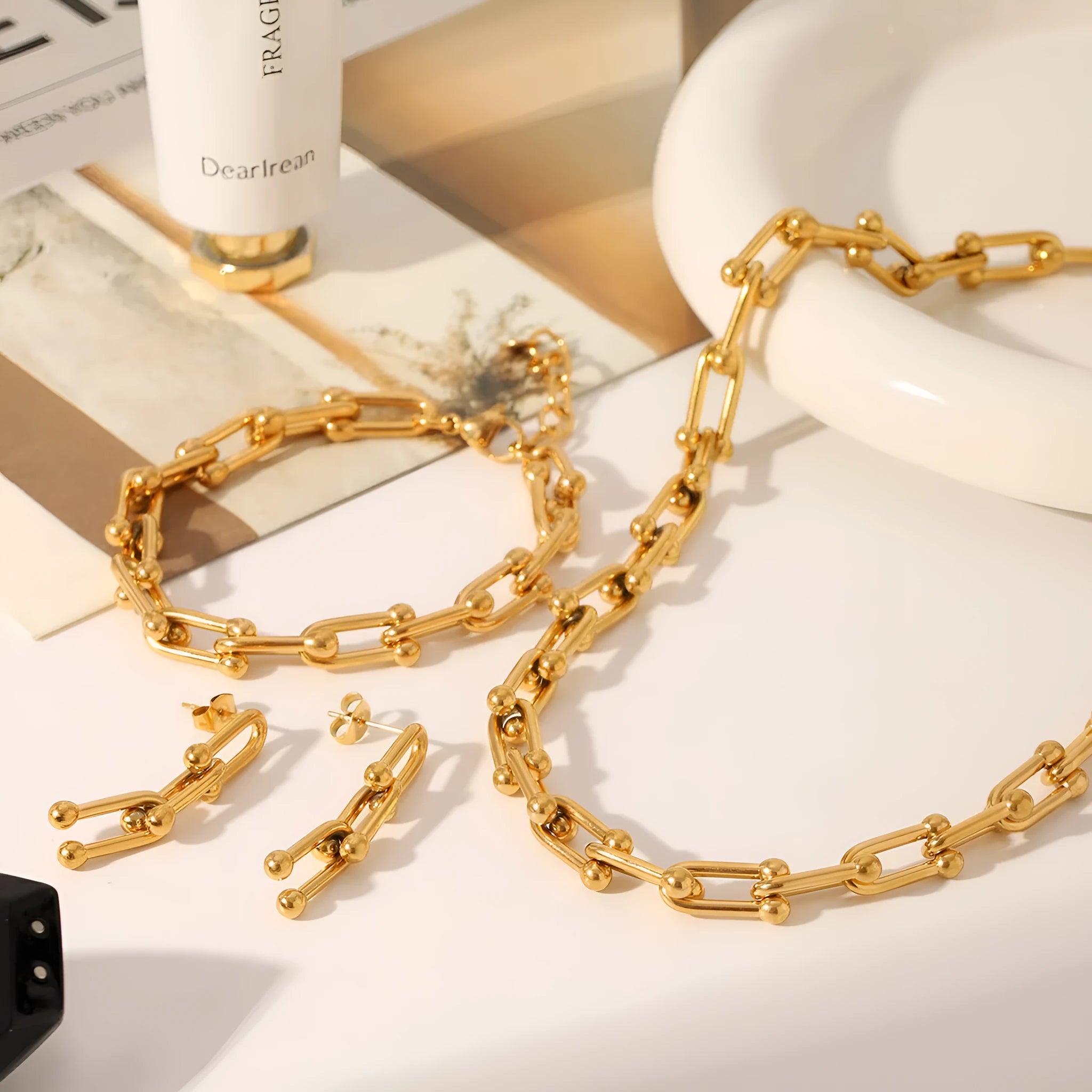 Stainless steel horseshoe chain jewellery set with necklace, bracelet and earrings featuring titanium steel pendants