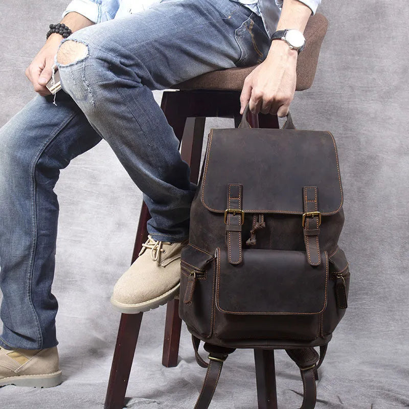 Brown crazy horse leather backpack with double shoulder straps and soft handle