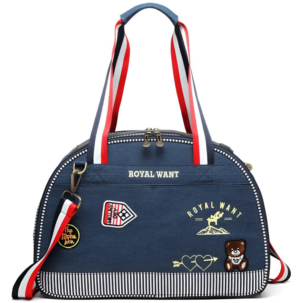 Blue denim pet carrier bag with cartoon pattern measuring 43cm by 20cm by 30cm
