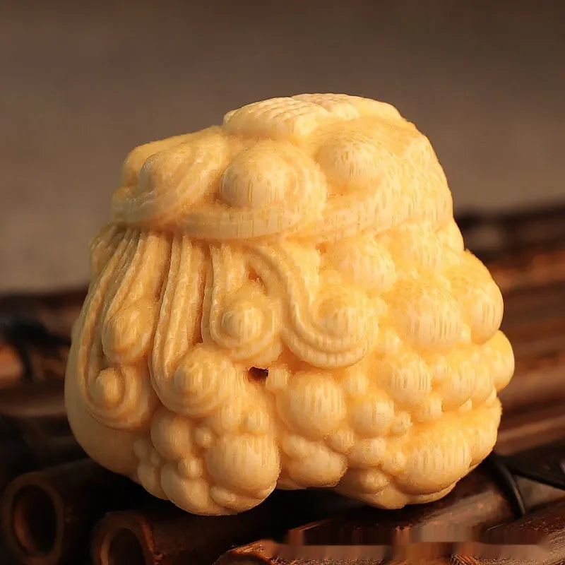 Solid bamboo carving of a cute golden toad Princess ornament for home display.