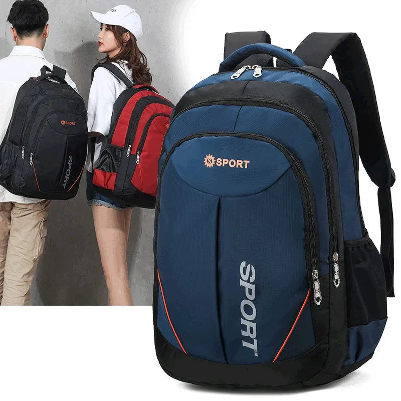 Large nylon backpack in black with curved shoulder straps and letter detailing, showing front compartment