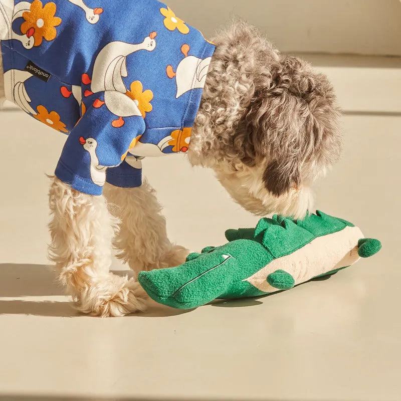 Green plush toy dog measuring 35cm long, designed as durable interactive pet toy