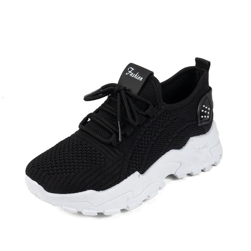 Women's white Flyknit mesh sports casual shoes with flat heel and lace-up front.
