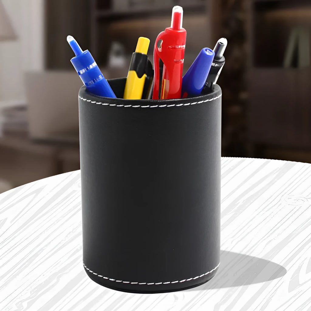 Black leather round pen container showing cylindrical shape for desk organisation