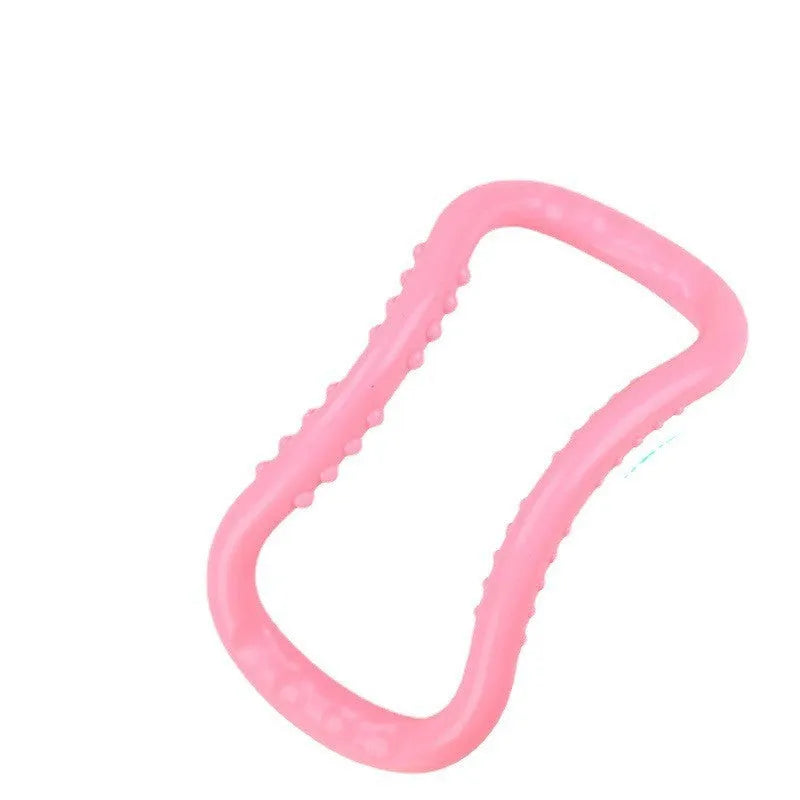 Purple, blue, and pink coloured yoga stretching ring for Pilates and back opening exercises.