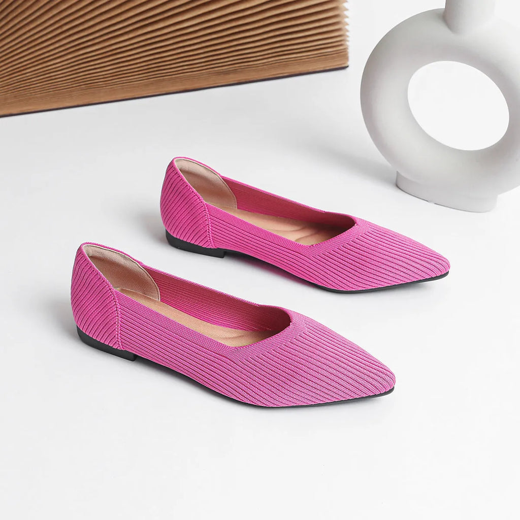 Women's knit flat pumps with pointed toe and rubber sole available in multiple colours