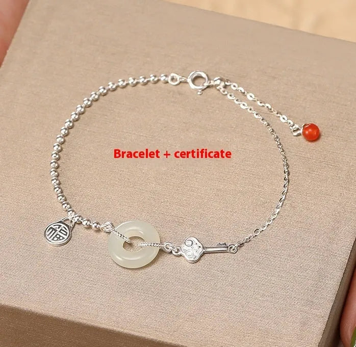 Silver bracelet with geometric peace buckle charm containing Hetian jade, traditional Chinese women's jewellery