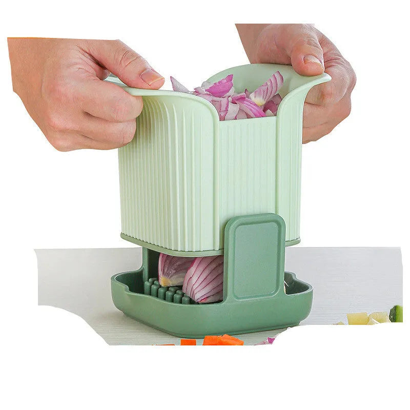 Green manual vegetable chopper for slicing onions, potatoes, radishes, and cucumbers with hand pressure operation