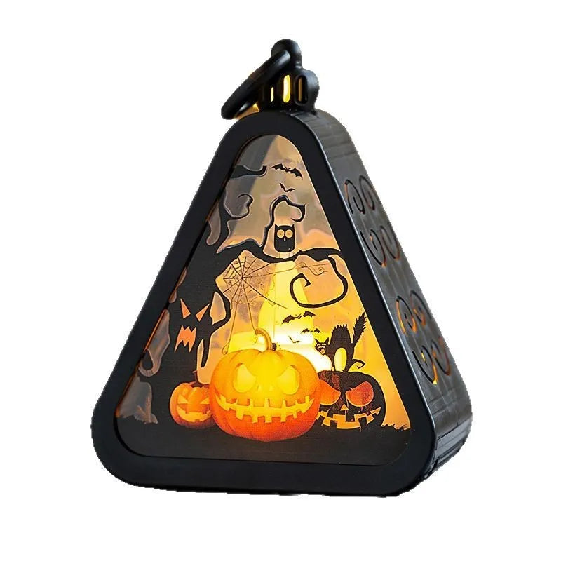 Portable Halloween lamp decoration in pumpkin design with plastic and glass construction.
