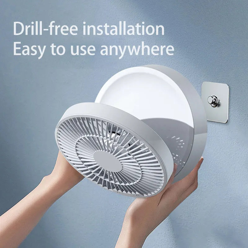 White portable folding fan with remote control and warm night light on desktop
