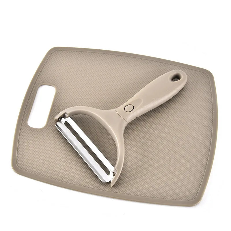 Green eight-piece multi-function kitchen planer set with stainless steel blades and ergonomic handles on a white background.