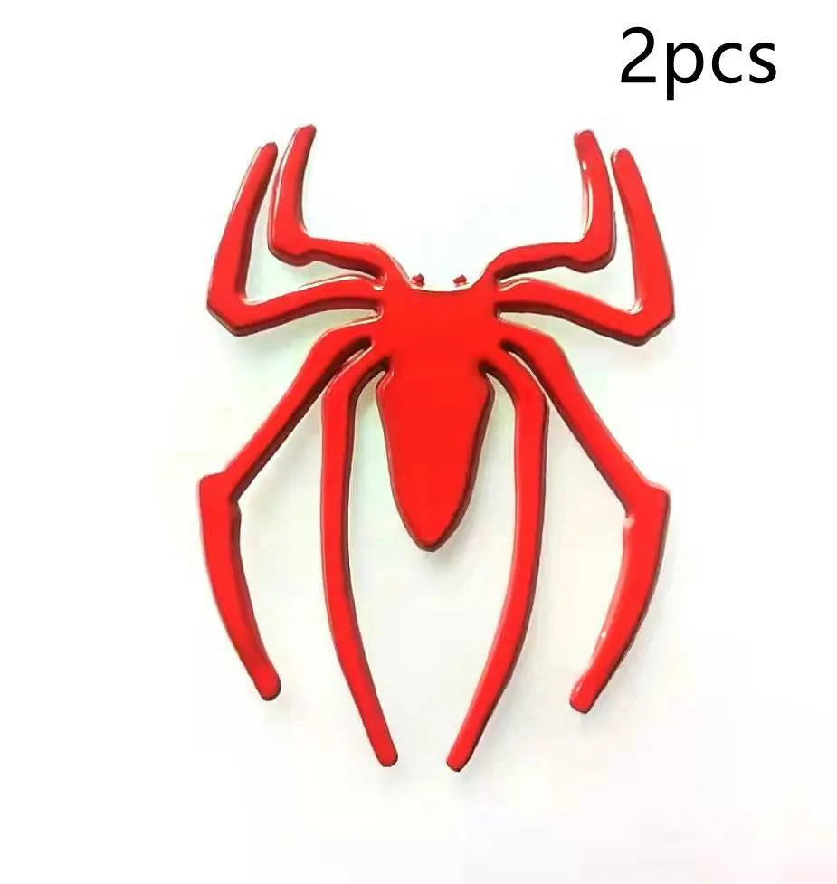 Three-dimensional metal spider car sticker in zinc alloy on a vehicle bumper.